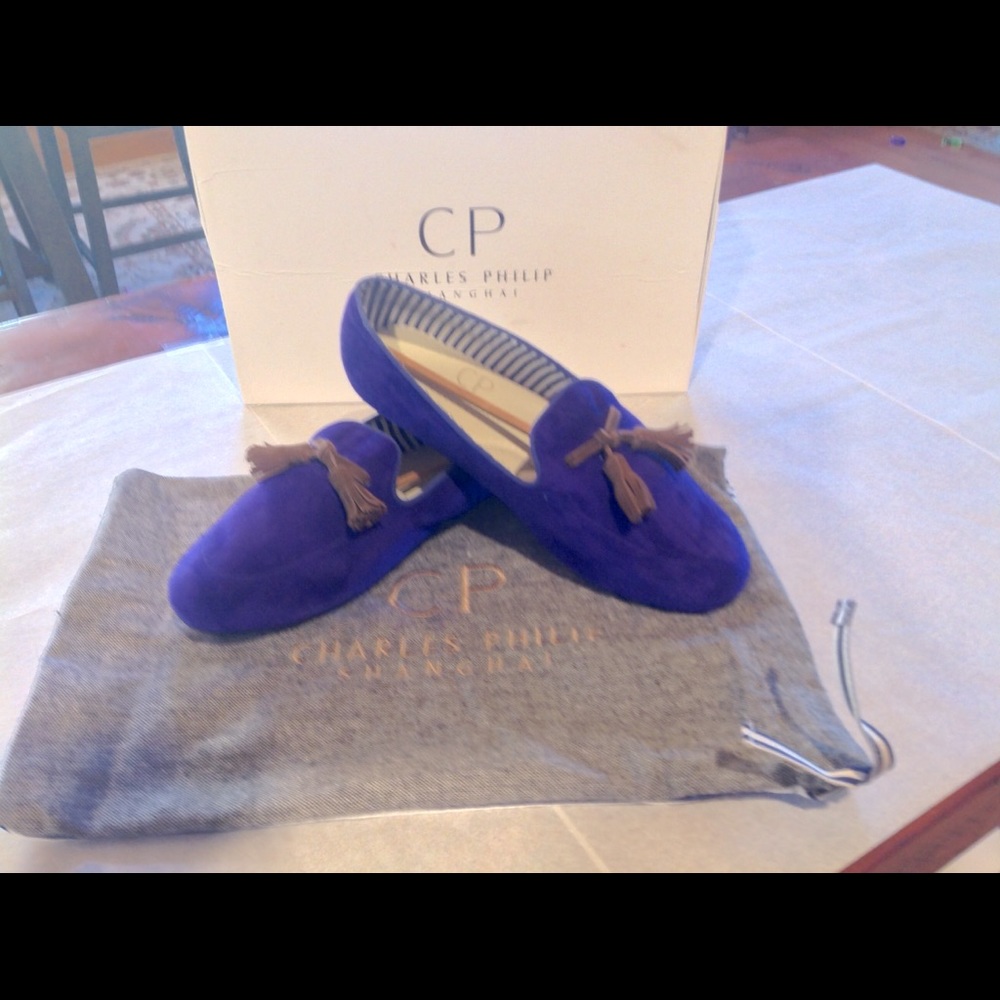 Purple Suede slippers.
